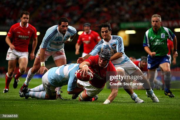 Wales forward Alun-Wyn Jones dives over to score the first try during the Friendly International Rugby Union Match between Wales and Argentina at the...