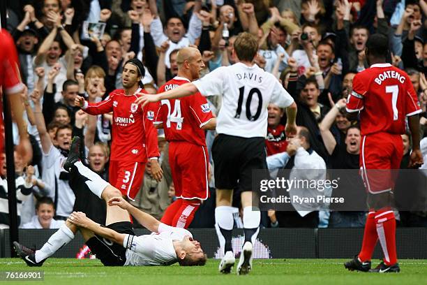 Brian McBride of Fulham screams in pain after injuring his leg after scoring the first goal of the game during the Barclays Premiership match between...