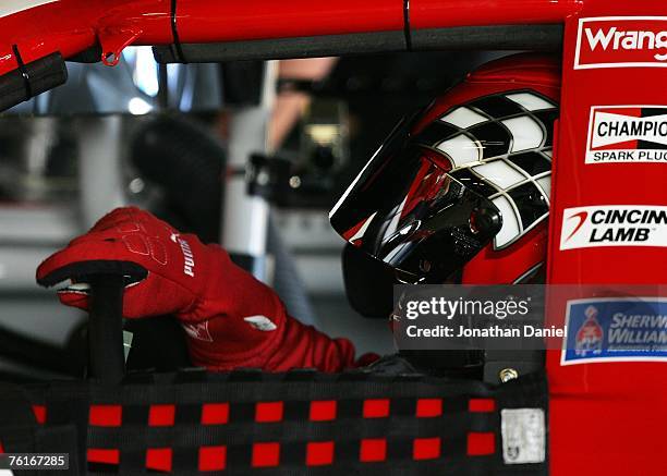 Dale Earnhardt Jr., driver of the Budweiser Chevrolet, sits in his car in the garage prior to practice for the NASCAR Nextel Cup Series 3M...