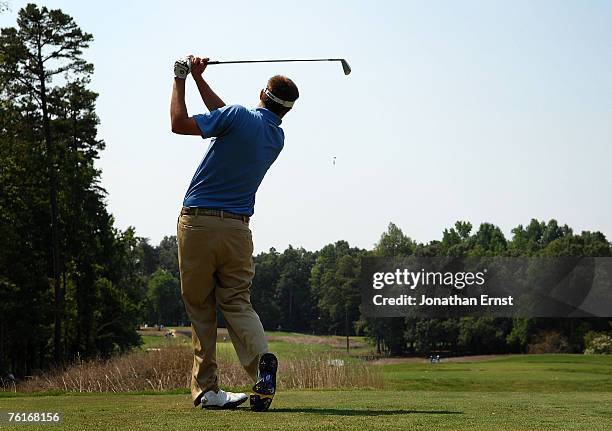 Jeff Overton hits from the third tee during the third round of the Wyndham Championship at Forest Oaks Country Club on August 18, 2007 in Greensboro,...