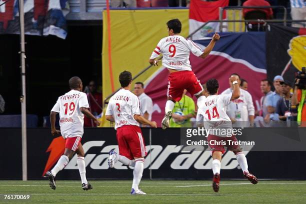 Juan Pablo Angel of the New York Red Bulls celebrates with his team after scoring a goal in the first half against the Los Angeles Galaxy at Giants...
