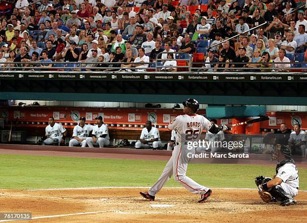 Barry Bonds of the San Francisco Giants watches his two run home run, his 760th of his career against pitcher Rick VandenHurk of the Florida Marlins...