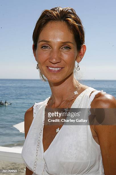 Ana Berman poses at Los Angeles Confidential Magazine and French Connection's summer celebration to benefit the Art Of Elysium at French Connection...
