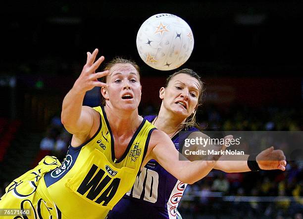 Kim Green of the Swifts and Natasha Chokjlat of the Phoenix contest possesion during the Commonwealth Bank Trophy Final match between the Melbourne...