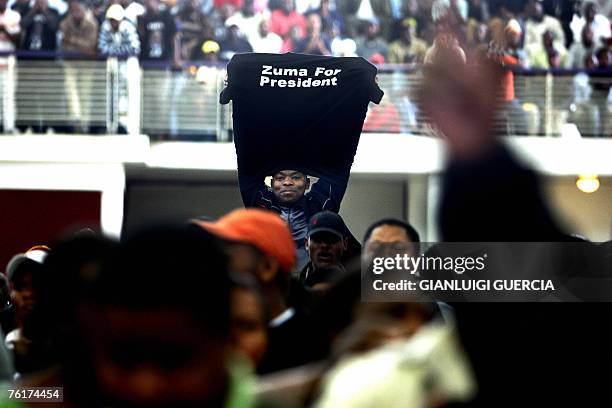 Supporters of Former South African deputy president and ruling party vice president Jacob Zuma gather 19 August 2007 to celebrate the 20th...