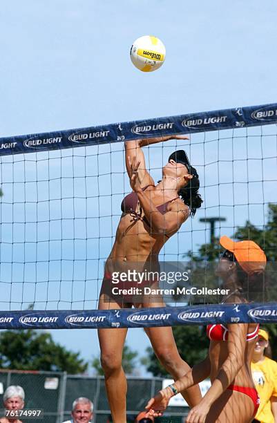 Tyra Turner hits a spike during semi-final action at the AVP Bob's Store Boston Open at Marina Bay August 19, 2007 in Quincy, Massachusetts. Trya...