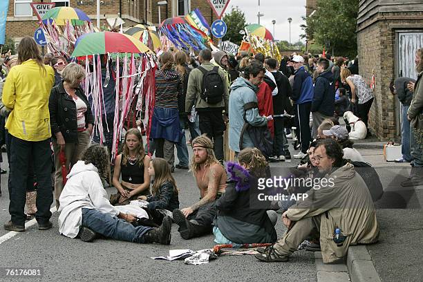 Protesters from the Camp For Climate Action gather 19 August 2007 in Harmondsworth which is at threat of being bulldozed to make way for the proposed...