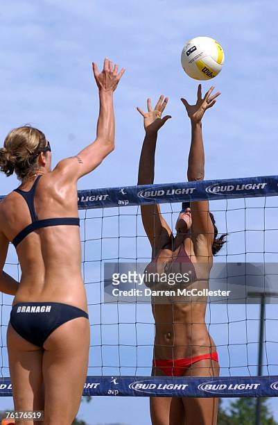 Nicole Branagh attempts a spike against Tyra Turner during semi-final action at the AVP Bob's Store Boston Open at Marina Bay August 19, 2007 in...