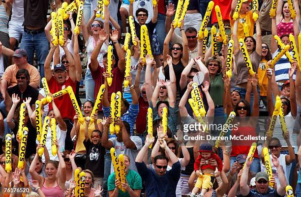 Fans cheer August 19, 2007 at the AVP Bob's Store Boston Open at Marina Bay in Quincy, Massachusetts. Kerri Walsh and Misty May-Treanor played Nicole...