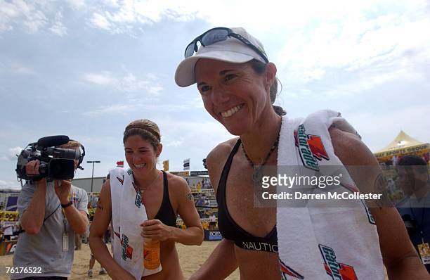 Nicole Branagh and Elaine Youngs celebrate following their victory at the AVP Bob's Store Boston Open at Marina Bay August 19, 2007 in Quincy,...