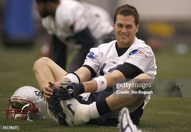 New England Patriots' Tom Brady stretches during a team in preparation for a play off game against the San Diego Chargers, Friday, January 12, 2007.