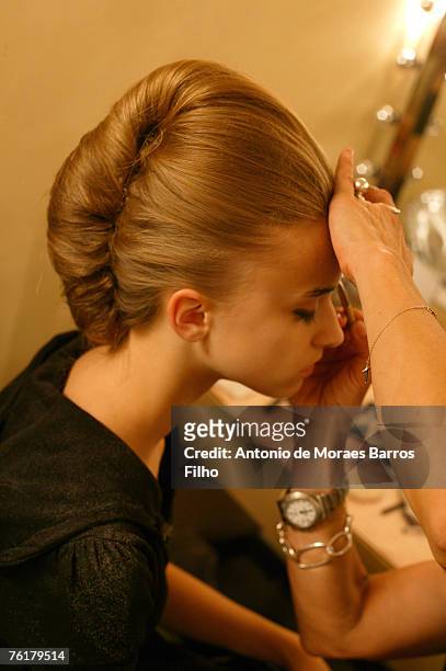 Model poses backstage at the Carven show during the Paris Haute Couture Fashion Week Fall/Winter 2008 on July 4, 2007 in Paris, France.