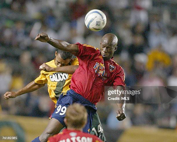 Galaxy's Tyrone Marshall battles Real Salt Lake's Dante Washington for an airball during the match at the Home Depot Center