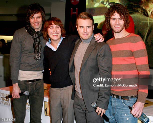 Jason Orange, Mark Owen, Gary Barlow and Howard Donald of Take That