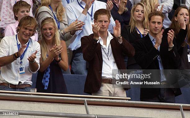 Chelsy Davy, Prince Harry and Prince William watch the Concert for Diana from the Royal box at Wembley Stadium on July 1, 2007 in London, England.