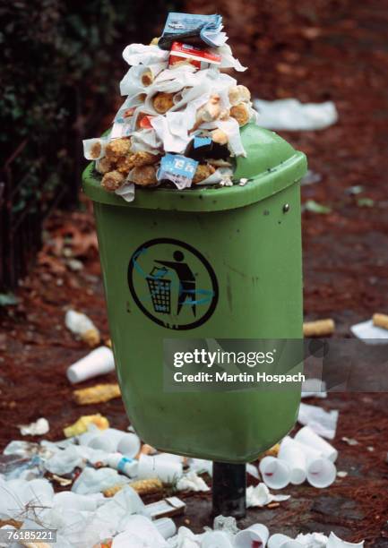 Garbage Overflow High Garbage Bin Overflowing With Trash High-Res Stock Photo - Getty Images