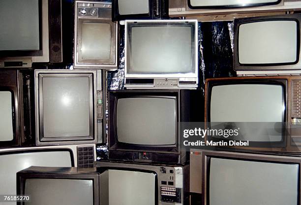 a collection of television sets - store display stock-fotos und bilder