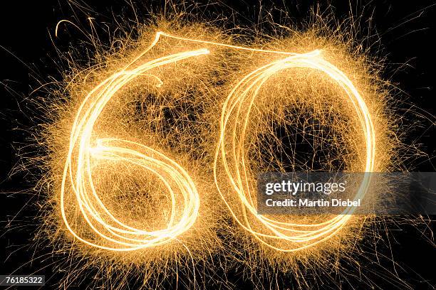 60' drawn with a sparkler - 60th anniversary foto e immagini stock