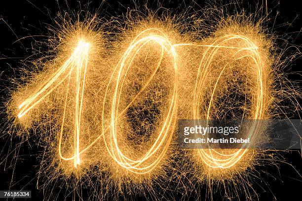 100' drawn with a sparkler - number 100 stock pictures, royalty-free photos & images