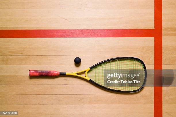 a squash racquet and ball - squash sport stock pictures, royalty-free photos & images