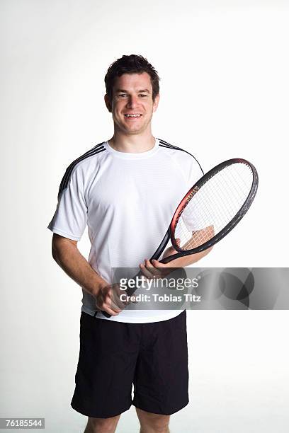 portrait of a tennis player - tennis racquet isolated stock pictures, royalty-free photos & images