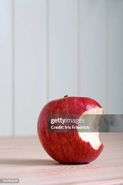 missing bite from an apple - missing bite stock pictures, royalty-free photos & images