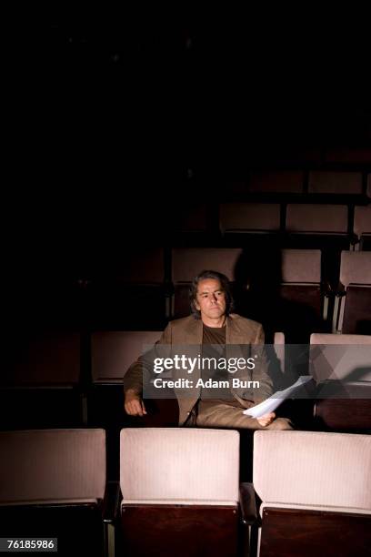a director sitting in a theater - audition stock pictures, royalty-free photos & images