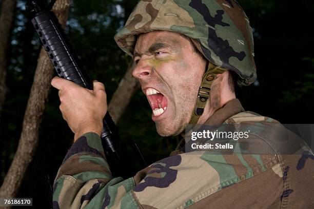 soldier shouting - army helmet stock pictures, royalty-free photos & images