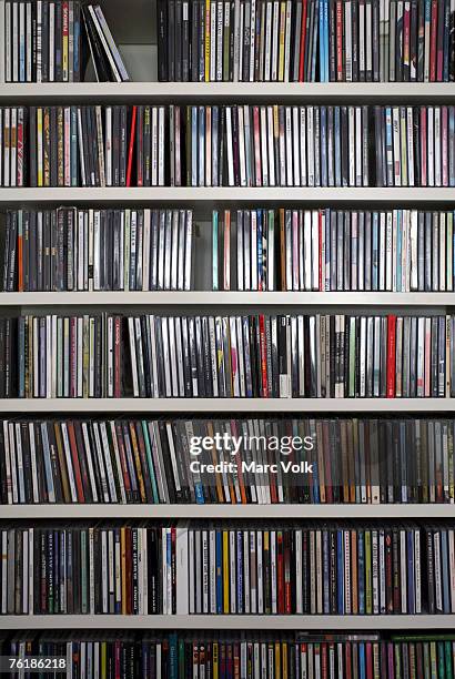 shelves of cds - cdケース ストックフォトと画像