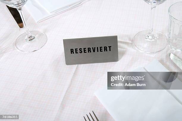 reserved sign on a restaurant table - 予約済み ストックフォトと画像