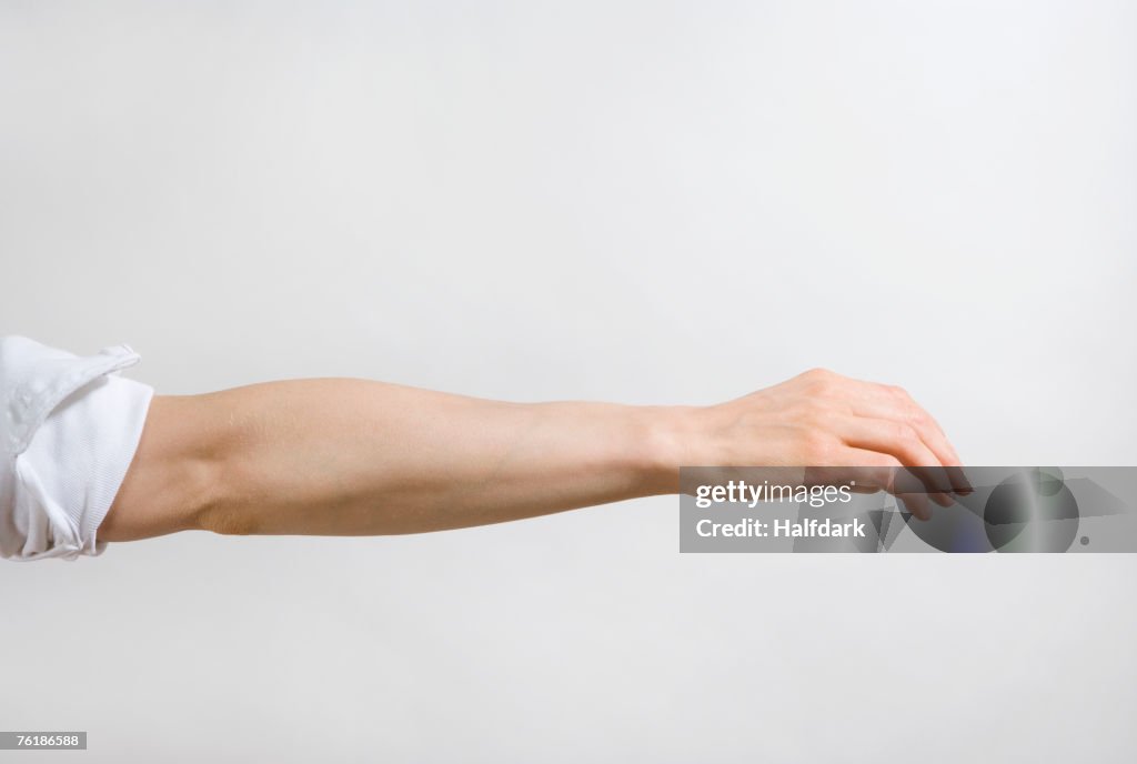 Detail of a man's arm outstretched