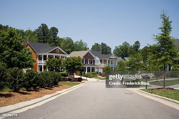 a residential street - idyllic neighborhood stock pictures, royalty-free photos & images