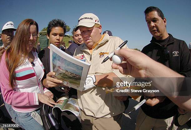 John Daly is greeted by a group a fans for his autograph as he approachs the third tee box during the 2006 Nissan Open Pro-Am, Presented by Country...