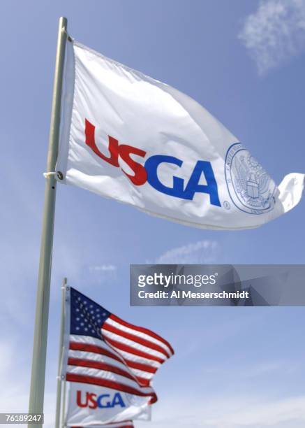 The USGA flag flies at Newport Country Club, site of the 2006 U. S. Women's Open in Newport, Rhode Island, June 26. Recent rains flooded sections of...