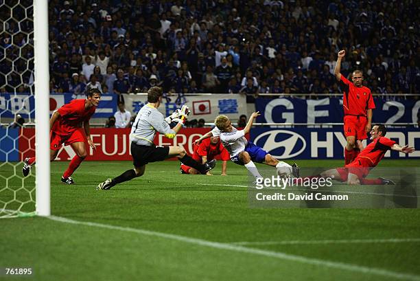 Junichi Inamoto of Japan scores a goal only to see it disallowed during the Group H World Cup Group Stage match against Belgium played at the Saitama...