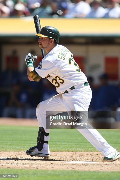 Nick Swisher of the Oakland Athletics bats during the game against the Kansas City Royals at McAfee Coliseum in Oakland, California on August 19,...