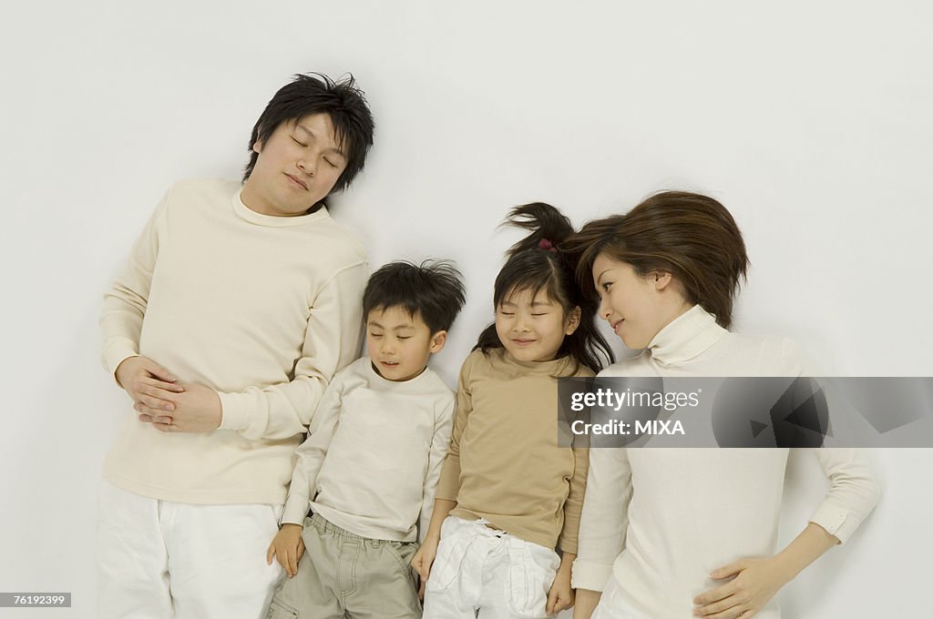 Family lying on floor