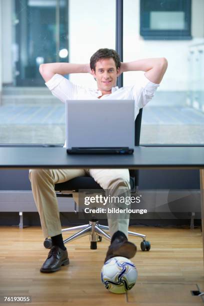 Working Under Table 129 Ball Under A Table Stock Photos, High-Res Pictures, and Images ...