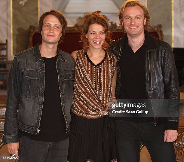 Actress Jessica Schwarz, actor August Diehl and actor Mark Waschke pose at a photocall for "Buddenbrooks" August 20, 2007 in Luebeck, Germany.