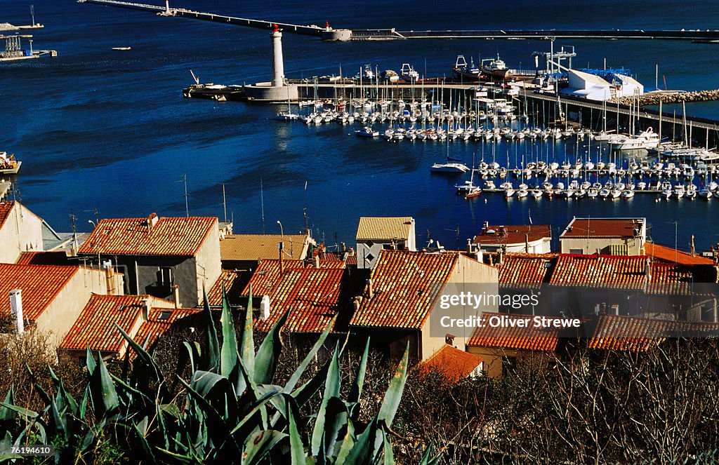 Harbour and waterfront buildings in foreground, Sete, Languedoc-Roussillon, France, Europe