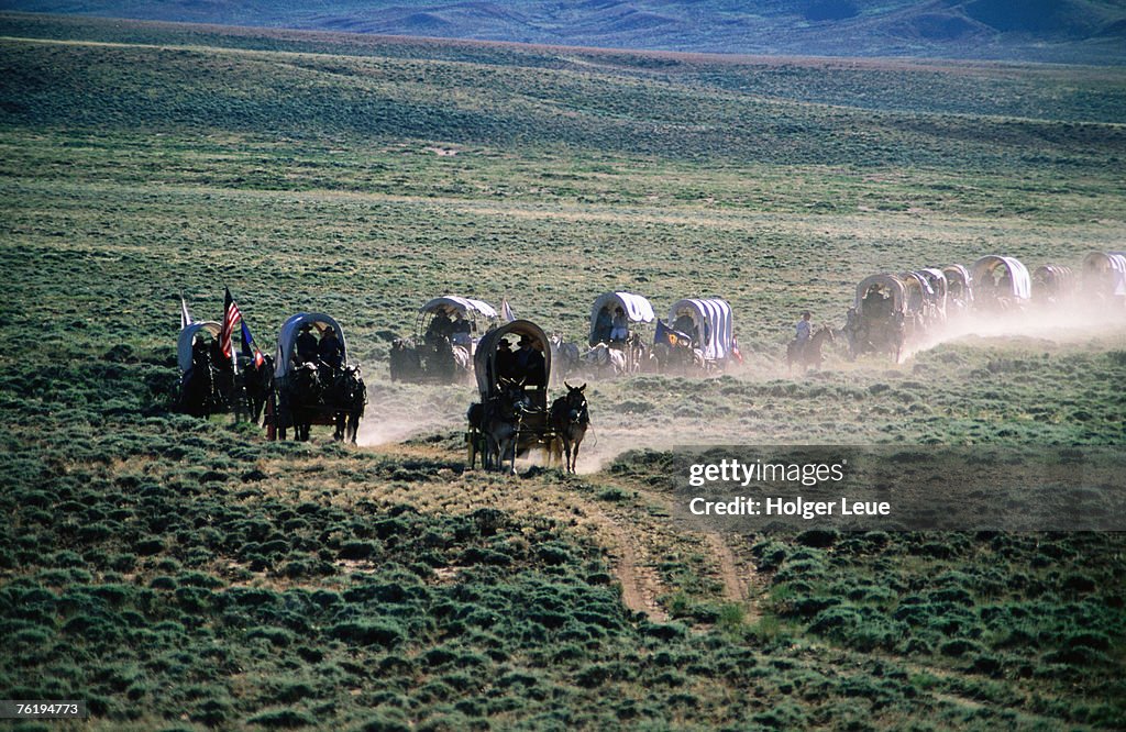 Dusty horse carriage trek, Mormon Pioneer Wagon Train to Utah, near South Pass, Wyoming, United States of America, North America