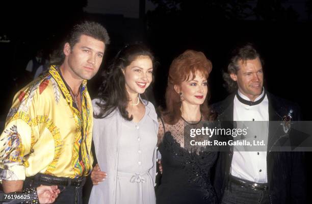 Country Singer Billy Ray Cyrus Actress Ashley Judd, Country Singer Naomi Judd, and Country Singer Randy Travis attend the 43rd Annual SHARE Boomtown...
