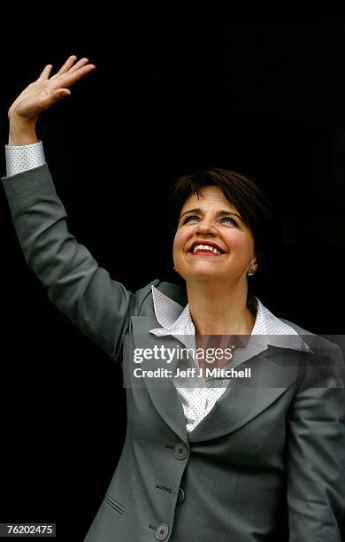 Scottish Labour MP Wendy Alexander waves at a press conference after being confirmed as the new leader of the Scottish Labour Party on August 21,...