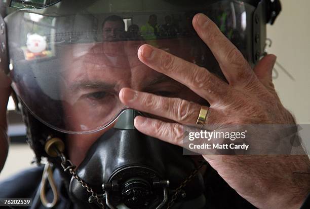 Miles Hilton-Barber, the blind adventurer, adjusts his flying helmet prior to his attempt to break the world air speed record for a blind pilot,...