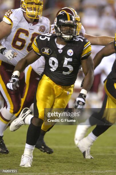 Ryan McBean of the Pittsburgh Steelers chases after the running back during the game against the Washington Redskins in a preseason NFL game on...