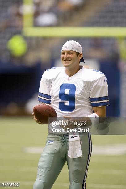 Quarterback Tony Romo of the Dallas Cowboys warms up prior to a preseason game against the Denver Broncos at Texas Stadium on August 18, 2007 in...