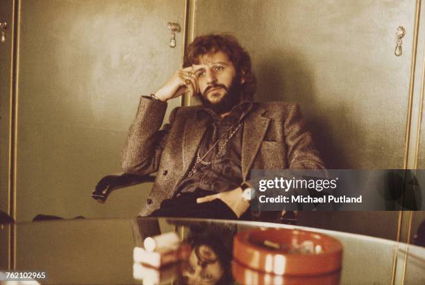 English musician, actor and former Beatles drummer, Ringo Starr pictured sitting in an office in London on 22nd October 1973.