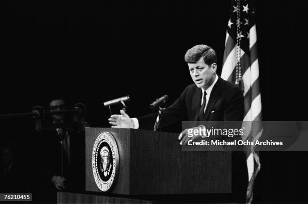 President John F. Kennedy answers a question at a press conference on April 14 in Washington, DC. This press conference took place three days before...