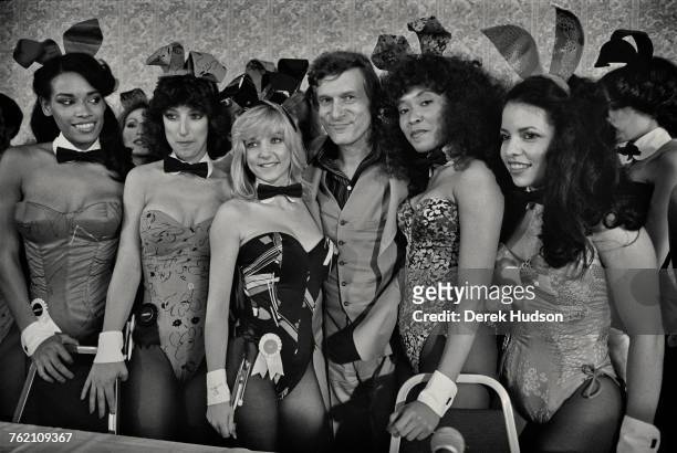 Playboy impresario Hugh Hefner with a group of Playboy Bunnies at the Grand Opening of the Playboy Hotel-Casino in Atlantic City, New Jersey, USA,...