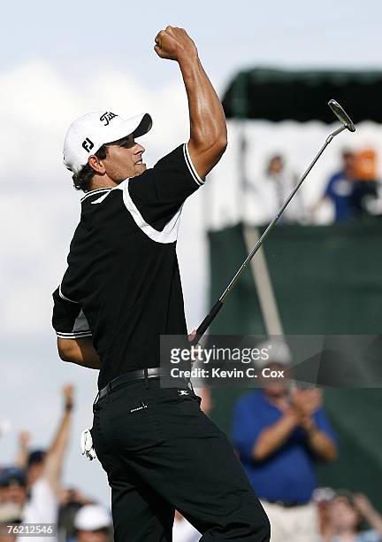 Adam Scott celebrates a par putt on the 18th green that gave him a two-shot victory in the final round of the 2007 Shell Houston Open Sunday, April 1...